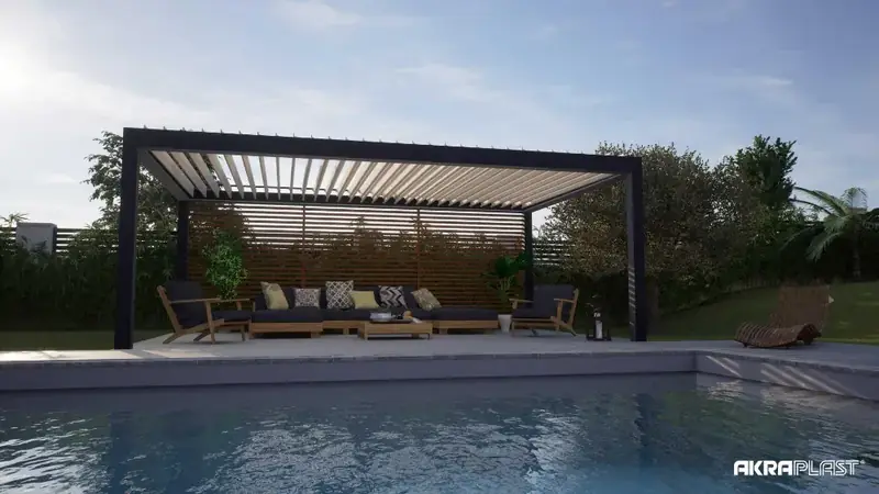 Pergola bioclimatique autoportée posée au milieu d'un jardin